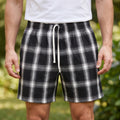Model wearing Black cotton shorts outdoors