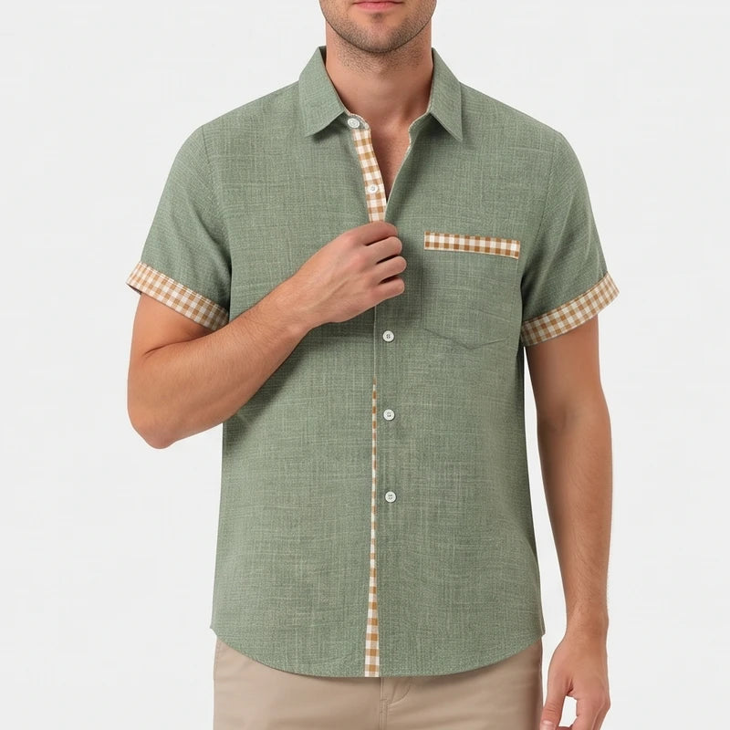 Green shirt on an off-gray studio background - 2