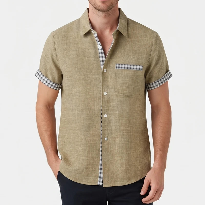 Khaki shirt on an off-gray studio background