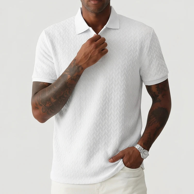 White polo on an off-gray studio background - 2