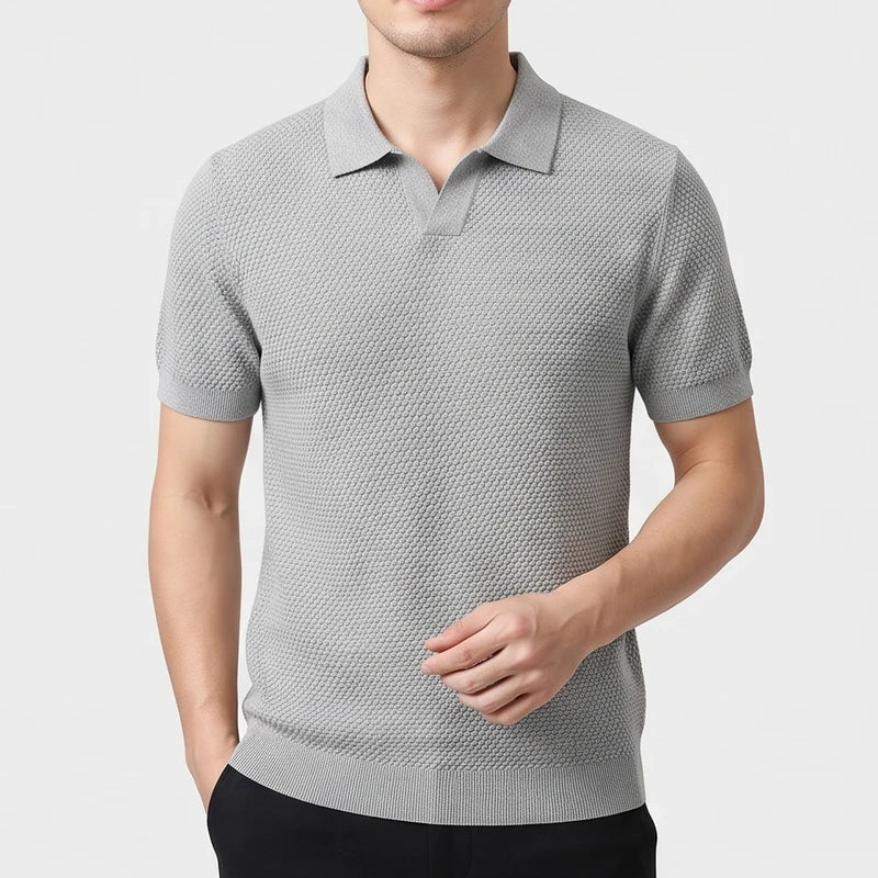 Gray knitted polo on an off-gray studio background - 2