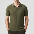 Green knitted polo on an off-gray studio background