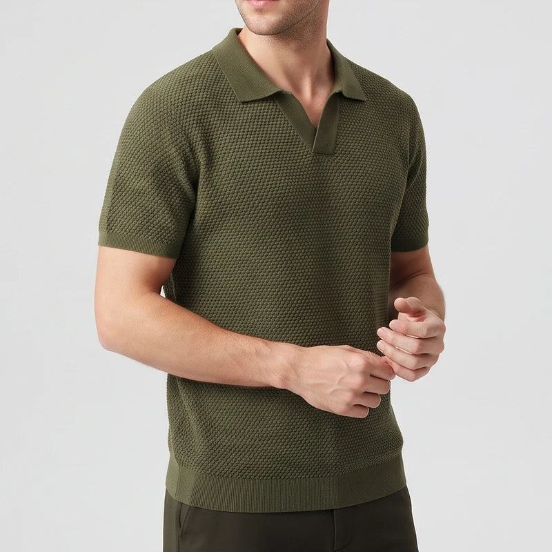 Green knitted polo on an off-gray studio background - 2