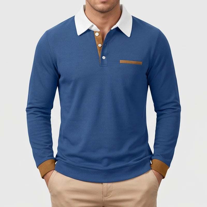 Blue polo on an off-gray studio background