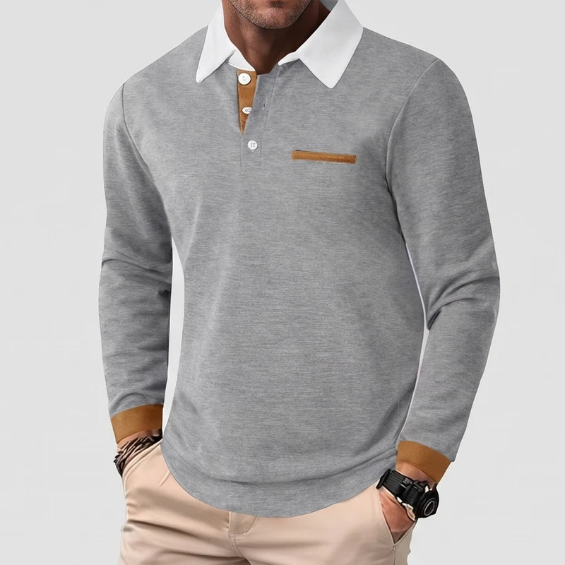 Gray polo on an off-gray studio background