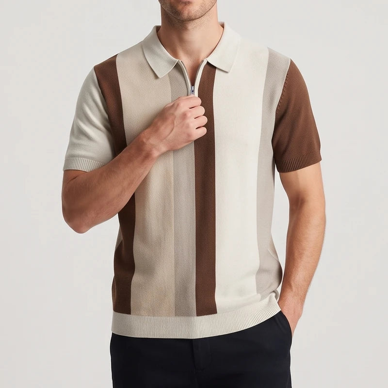 Man wearing a short-sleeved, collared knit shirt with vertical stripes in cream, light, and dark brown.