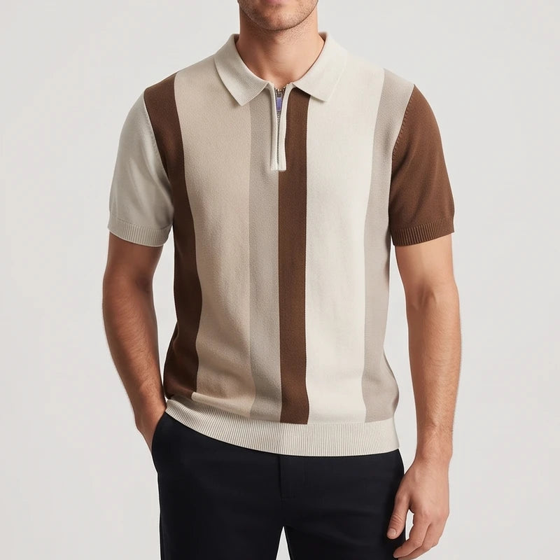 Man wearing a knitted quarter-zip polo shirt with vertical beige, brown, and cream stripes, paired with black pants.