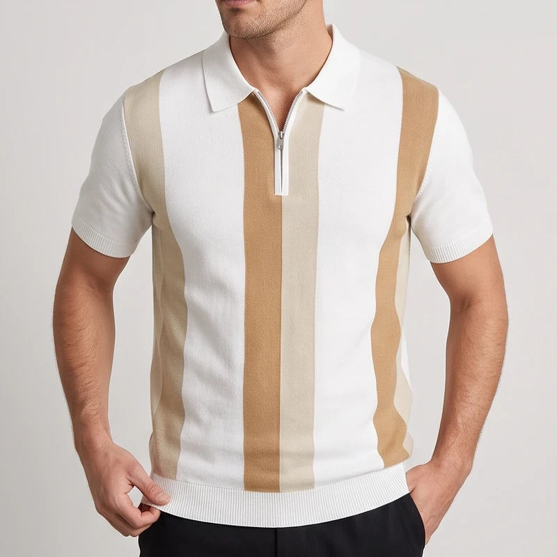 Man wearing a short-sleeved, knitted polo shirt with white, light beige, and tan vertical stripes, featuring a white collar and quarter-zip.