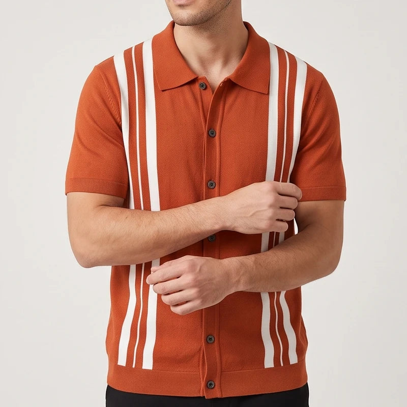 Man wearing a rust orange knit short-sleeve button-up shirt with vertical white stripes and dark buttons, seen from the chest up.