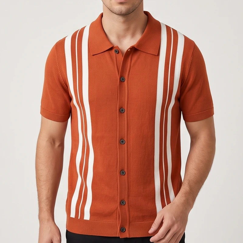 Man wearing a rust orange short-sleeve button-up shirt with white vertical wavy stripes and dark brown buttons.