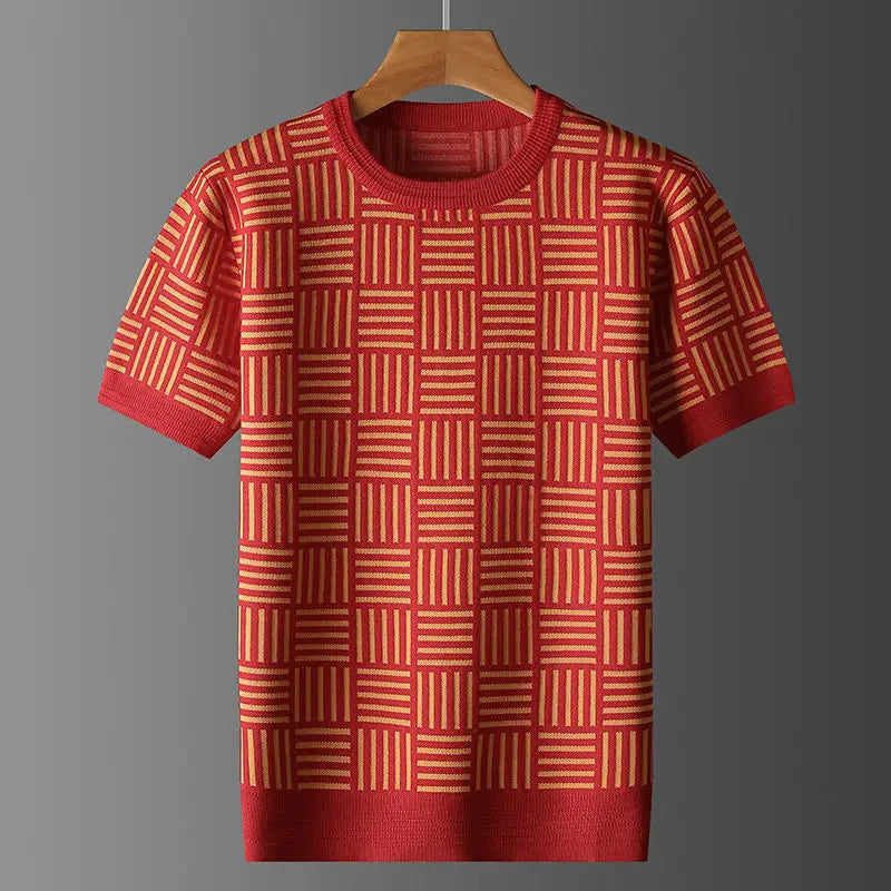 Red short sleeve knit shirt with a gold checkered pattern, featuring ribbed cuffs, hem, and crew neck, displayed on a hanger.
