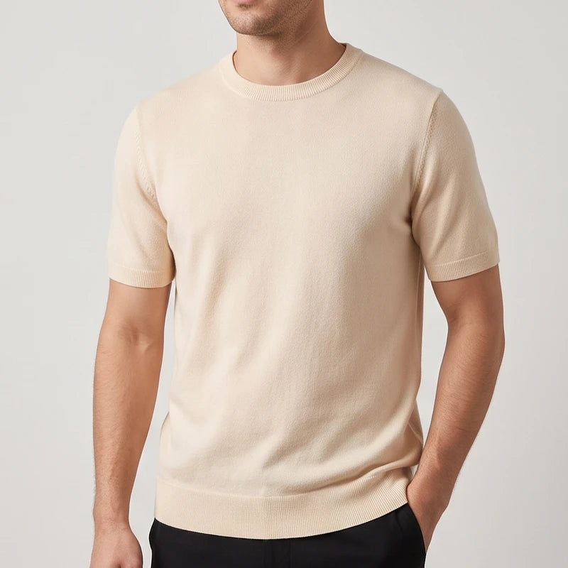 Beige sweater on an off-gray studio background