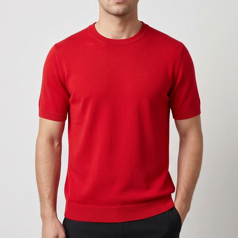Red sweater on an off-gray studio background