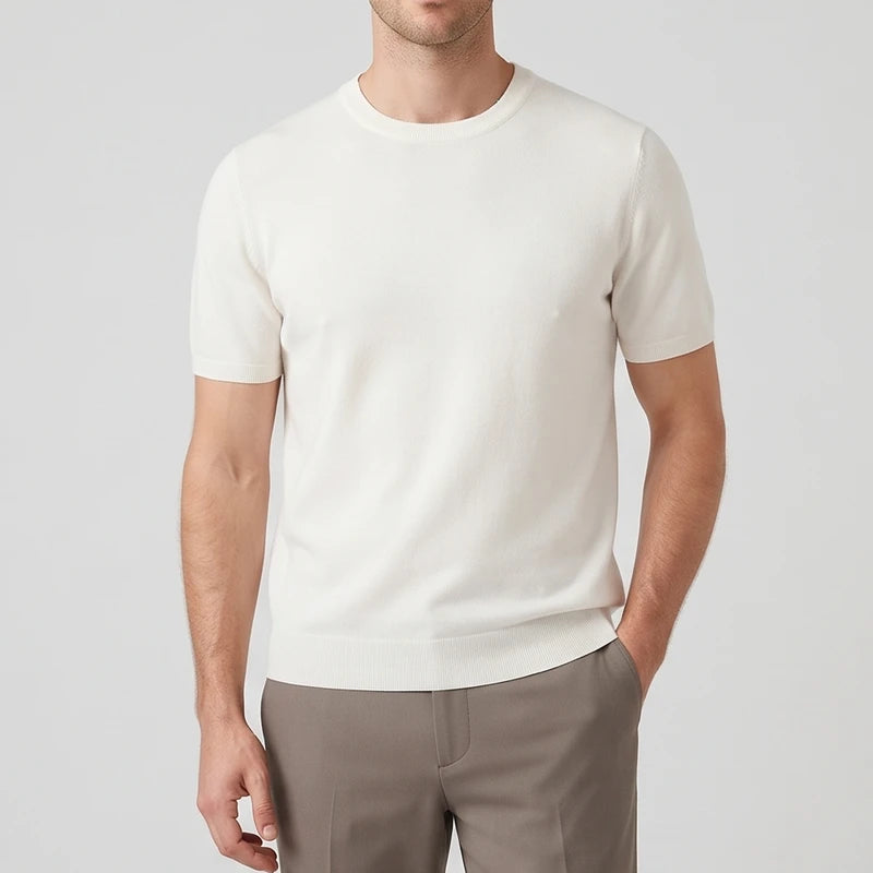White sweater on an off-gray studio background