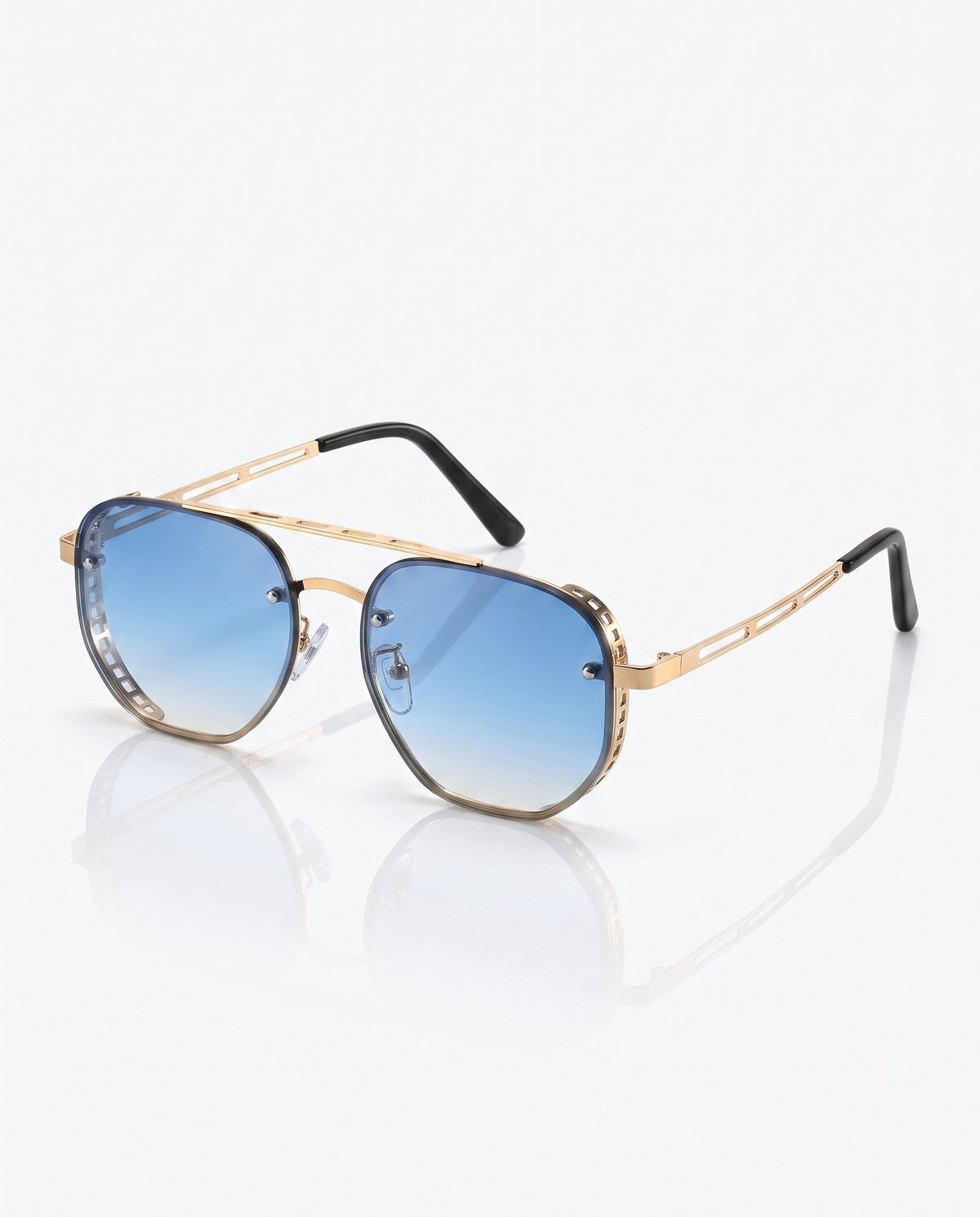 Gold-framed sunglasses with blue gradient lenses, a double bridge, and intricate cut-out details on the sides.
