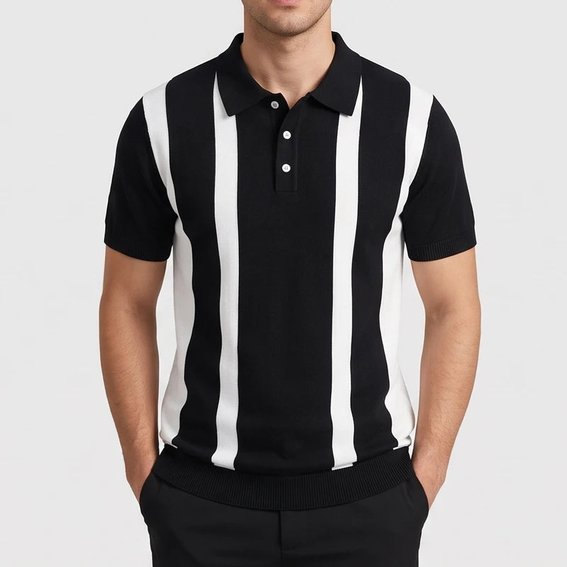 Black knitted polo on an off-gray studio background