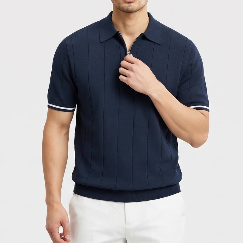 Navy knitted polo on an off-gray studio background - 2