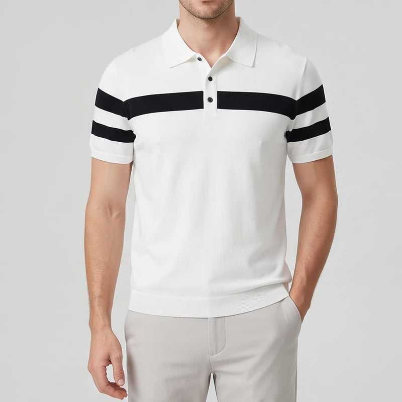 White silk polo on an off-gray studio background