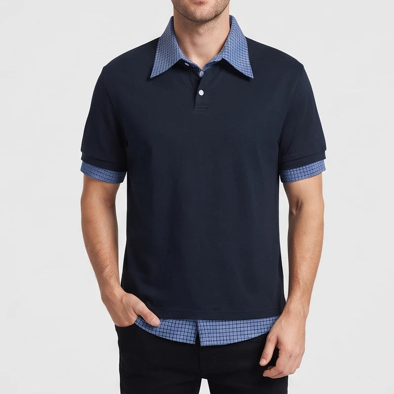 Blue polo on an off-gray studio background